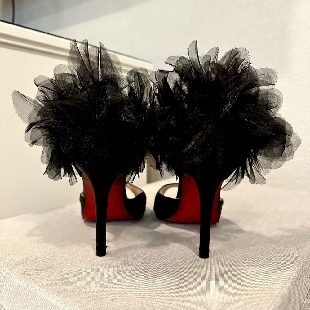 CHRISTIAN LOUBOUTIN RED BOTTOMS